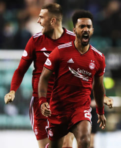 Former Brentford star Shay Logan has signed for Hearts.