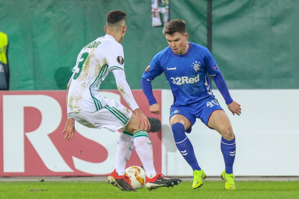 VIENNA, AUSTRIA - DECEMBER 13: Mert Muelduer of Rapid and Glenn Middleton of Rangers during the UEFA Europa League match between Rapid Wien and Rangers at Weststadion on December 13, 2018 in Vienna, Austria.