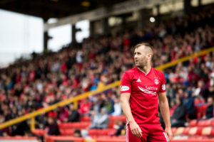 Niall McGinn is doing his bit.