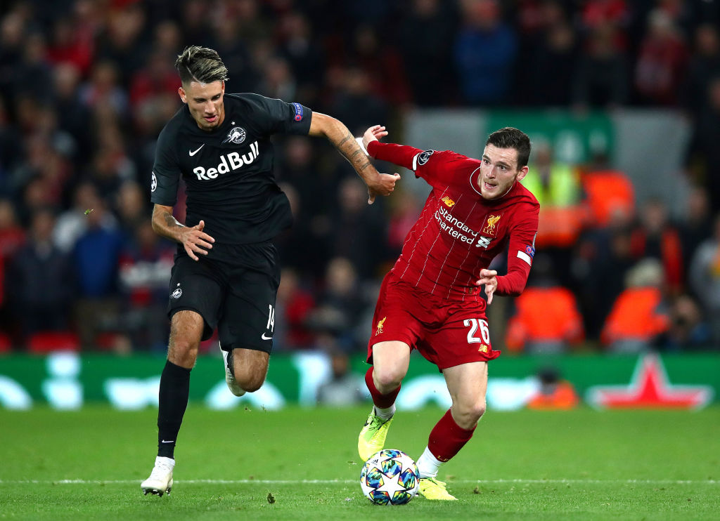Watch as Robertson scores for Liverpool.