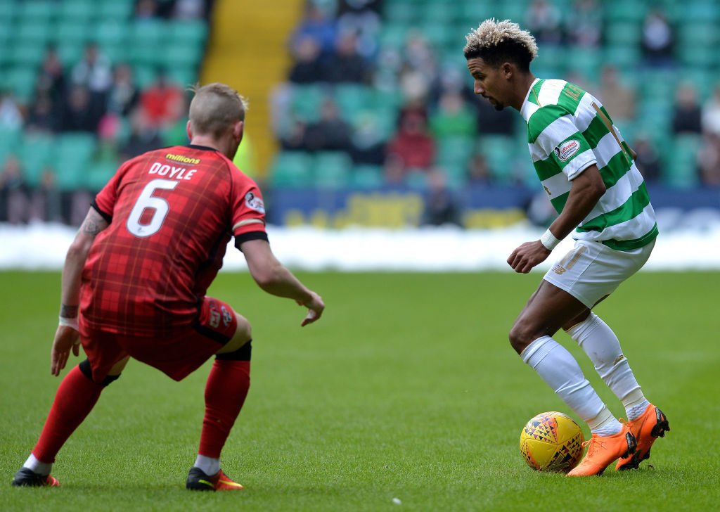 GLASGOW, SCOTLAND - MARCH 03: Scott Sinclair of Celtic is tracked by Michael Doyle of Greenock Morton during the Scottish Cup Quarter Final match between Celtic and Greenock Morton at Celtic Park on March 3, 2018 in Glasgow, Scotland.