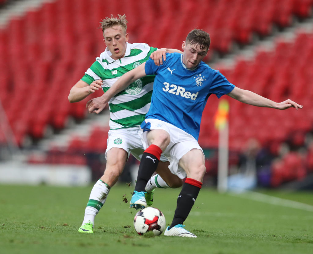 GLASGOW, SCOTLAND - APRIL 26: Calvin Miller of Celtic vies Jordan Houston of Rangers during The Scottish FA Youth Cup Final between Celtic and Rangers at Hampden Park on April 26, 2017 in Glasgow, Scotland.
