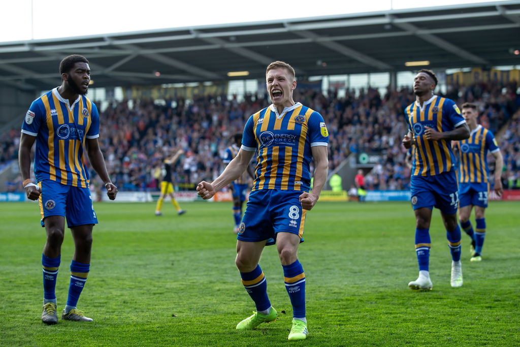 Greg Docherty of Shrewsbury Town celebrates after scoring to give Shrewsbury the lead during the Sky Bet League 1 match between Shrewsbury Town and Oxford United at Greenhous Meadow, Shrewsbury on Monday 22nd April 2019.
