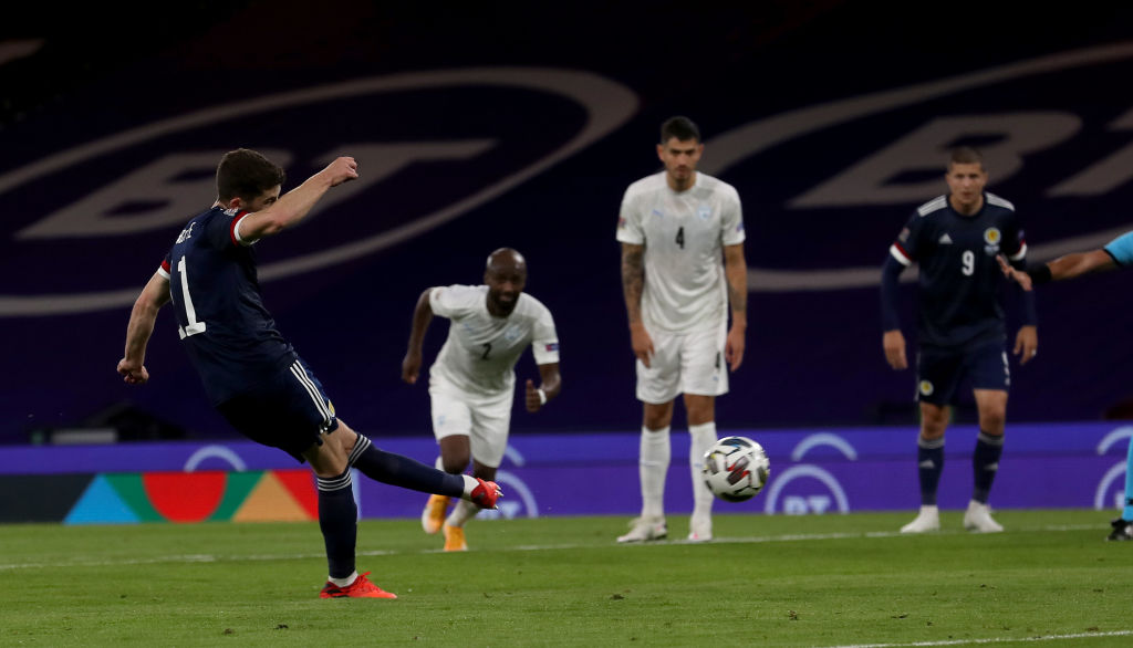 GLASGOW, SCOTLAND - SEPTEMBER 04: Ryan Christie of Scotland scoring from the penalty spot during the UEFA Nations League group stage match between Scotland and Israel at Hampden Park National Stadium on September 04, 2020 in Glasgow, Scotland.