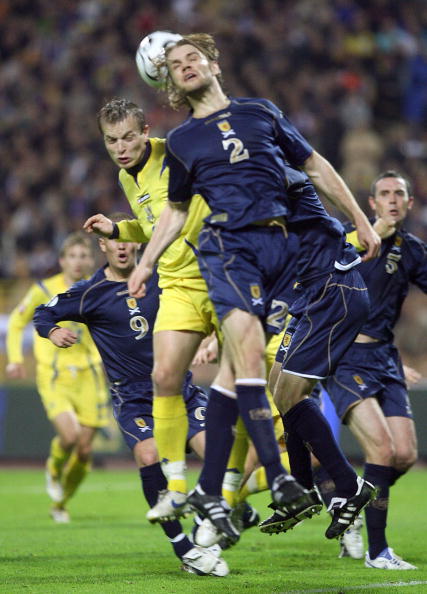 Ukraine's Oleg Gusiev (L) fights for a b