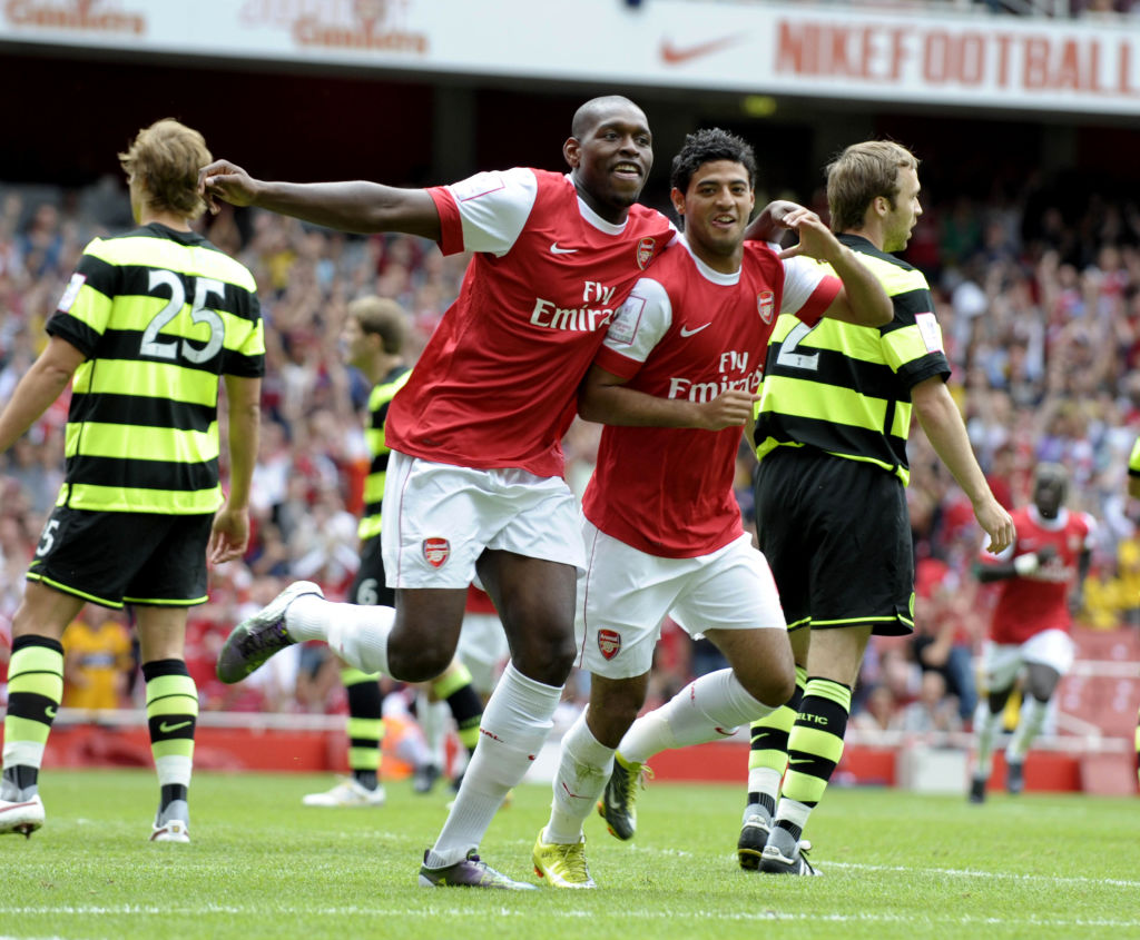 Arsenal's Carlos Vela (R) celebrates sco