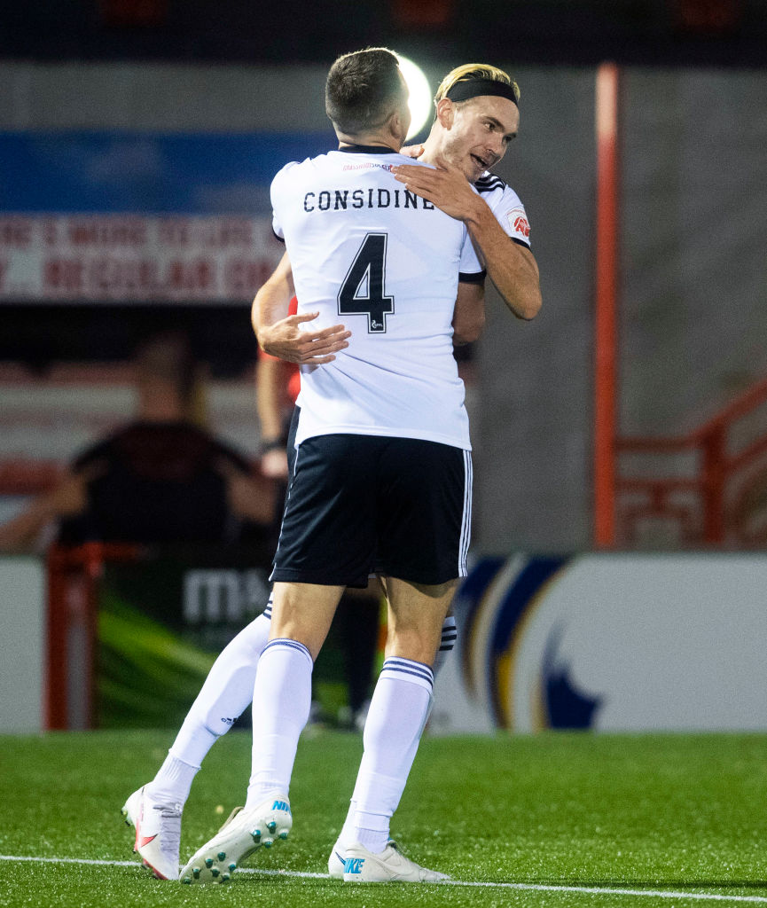 Ryan Hedges is congratulated by Andy Considine