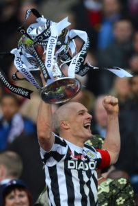 Jim Goodwin lifts the league cup for St Mirren in 2013