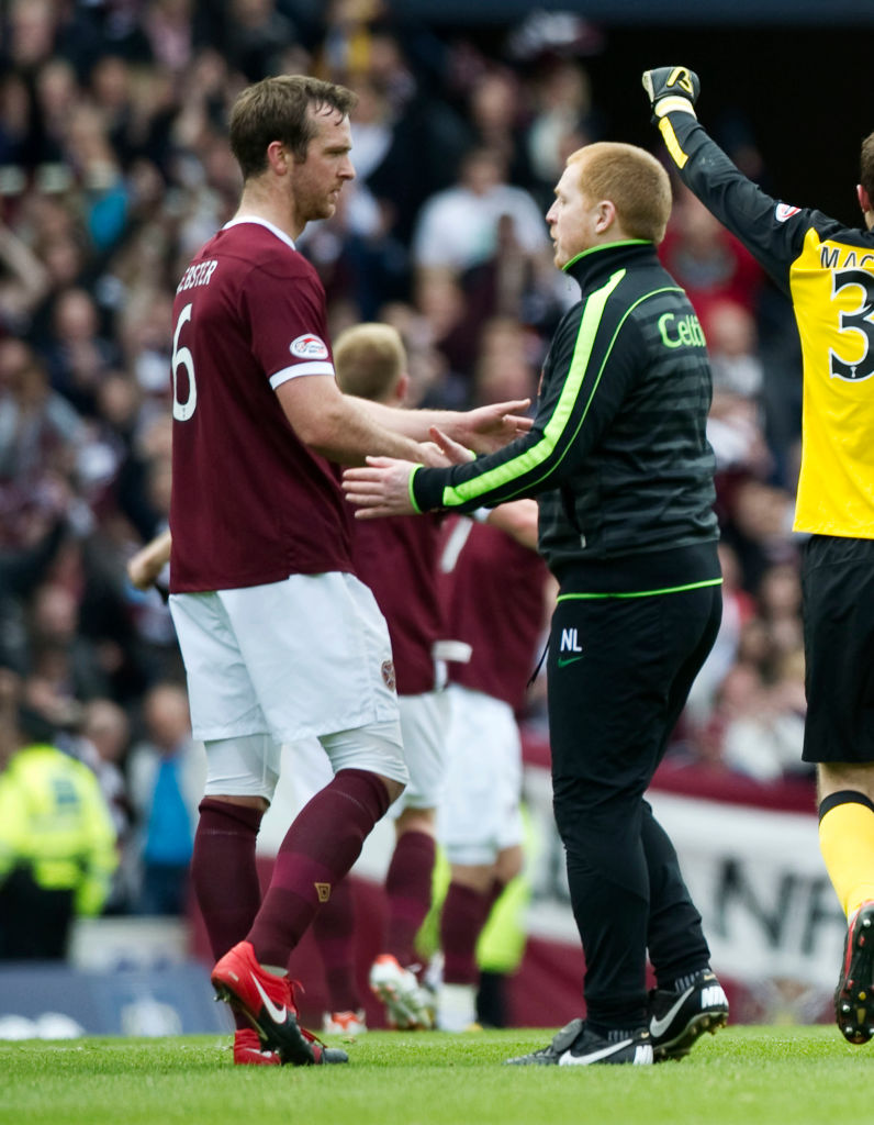 15/04/12 WILLIAM HILL SCOTTISH CUP SEMI-FINAL.CELTIC v HEARTS (1-2).HAMPDEN - GLASGOW.Hearts' Andy Webster with Celtic manager at full time.