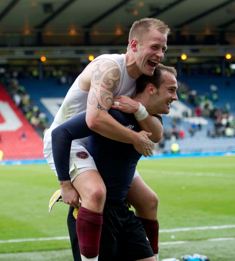 15/04/12 WILLIAM HILL SCOTTISH CUP SEMI-FINAL.CELTIC v HEARTS.HAMPDEN - GLASGOW.Danny Grainger (left) celebrates at full time with Hearts team-mate Jamie MacDonald