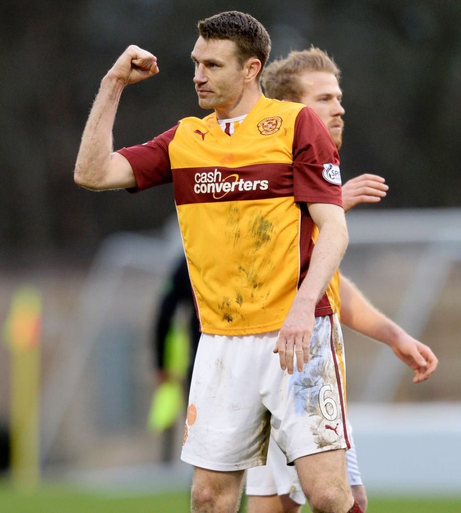 15/02/14 SCOTTISH PREMIERSHIP.MOTHERWELL v PARTICK THISTLE.FIR PARK - MOTHERWELL.Motherwell's Stephen McManus celebrates at full-time