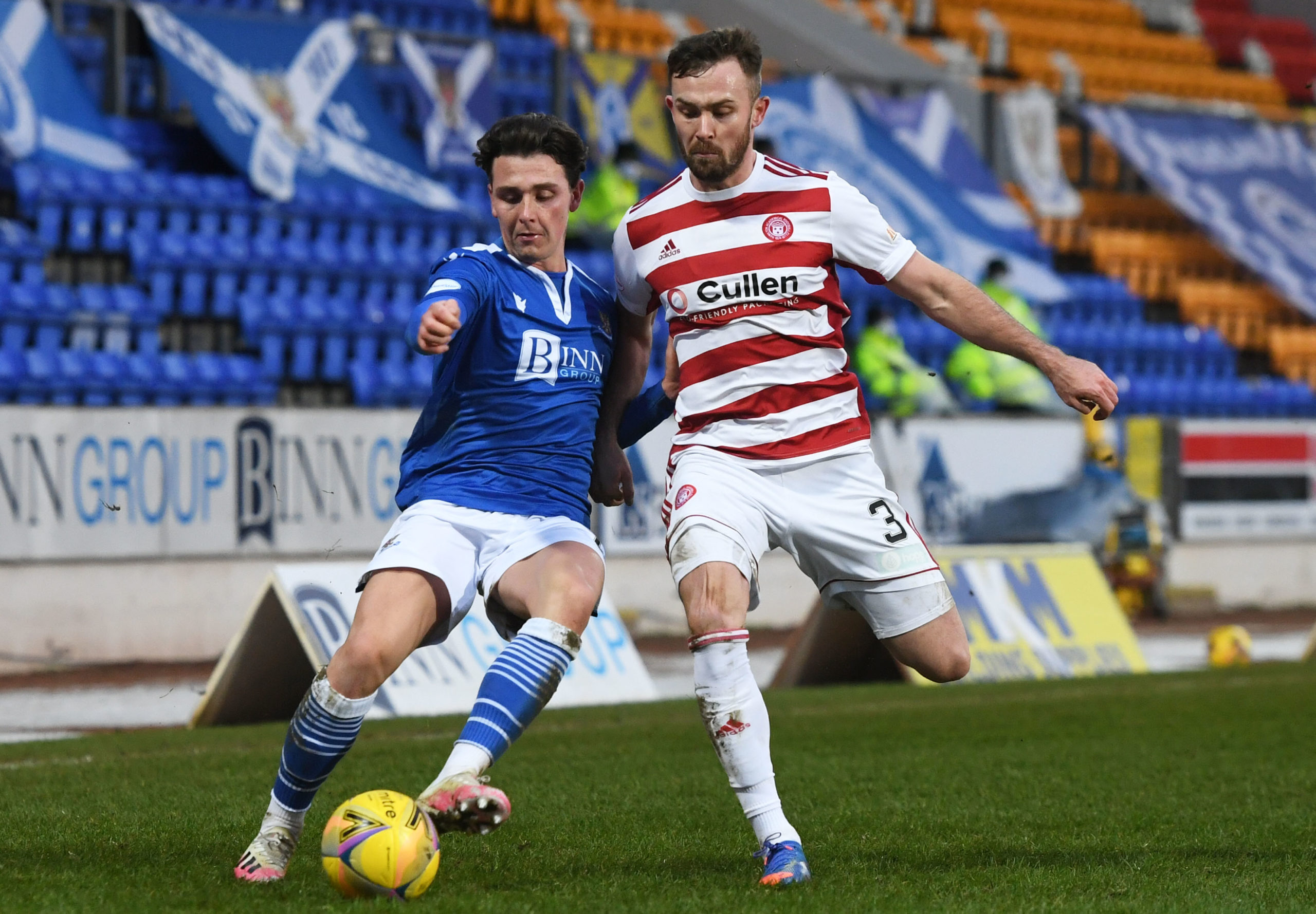 left0 competes with Scott McCann during a Scottish Premiership match between St Johnstone and Hamilton at McDiarmid Park, on December 30, 2020, in Perth, Scotland. (Photo by Ross MacDonald/SNS Group via Getty Images