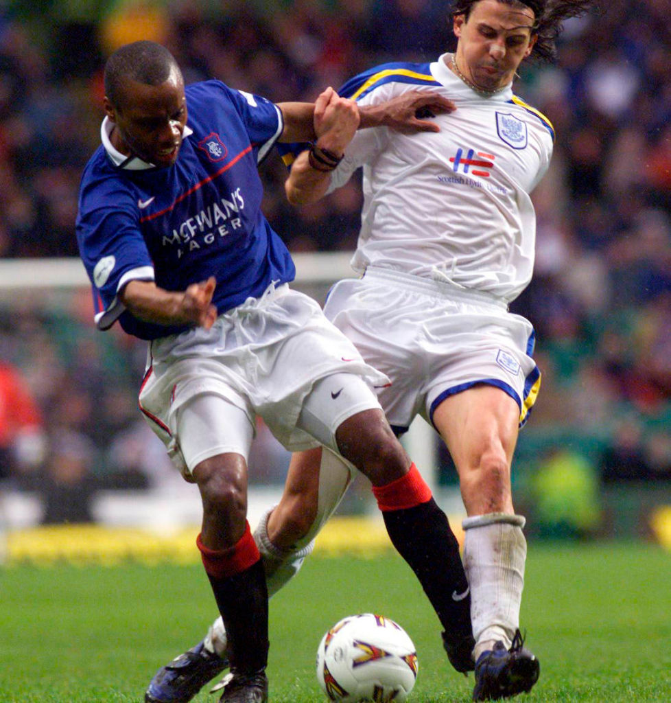 11/04/99 Tennent'S Scottish Cup Semi-Final.St Johnstone V Rangers (0-4).Celtic Park - Glasgow.Rangers Striker Rod Wallace (Left) Battles For Possession With Nick Dasovic.