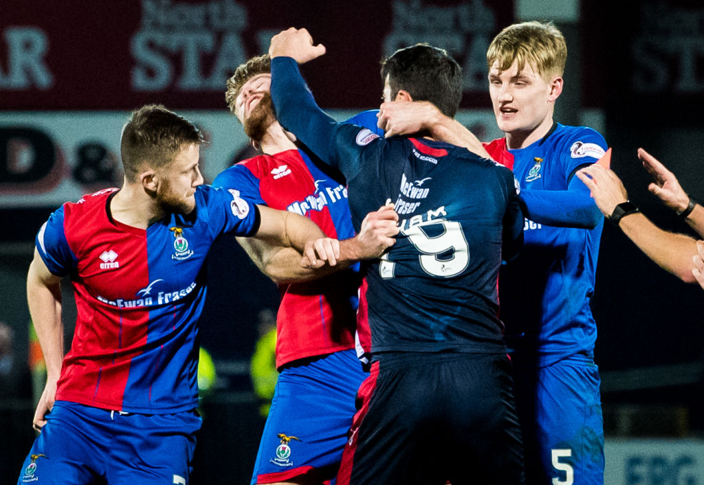 29/12/18 LADBROKES CHAMPIONSHIP.ROSS COUNTY VS INVERNESS CT.THE GLOBAL ENERGY STADIUM-DINGWALL.Ross County's Brian Graham (right) is sent off after throwing a punch at Inverness CT's Shaun Rooney.