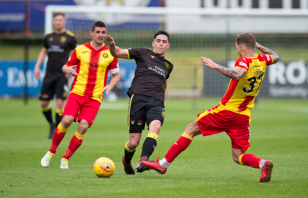 20/05/18 LADBROKES PREMIERSHIP PLAY OFF FINAL 2ND LEG.PARTICK THISTLE V LIVINGSTON.THE ENERGY CHECK STADIUM AT FIRHILL - GLASGOW.Livingston's Jackson Longridge (centre) in action with Partick Thistle's Martin Woods.