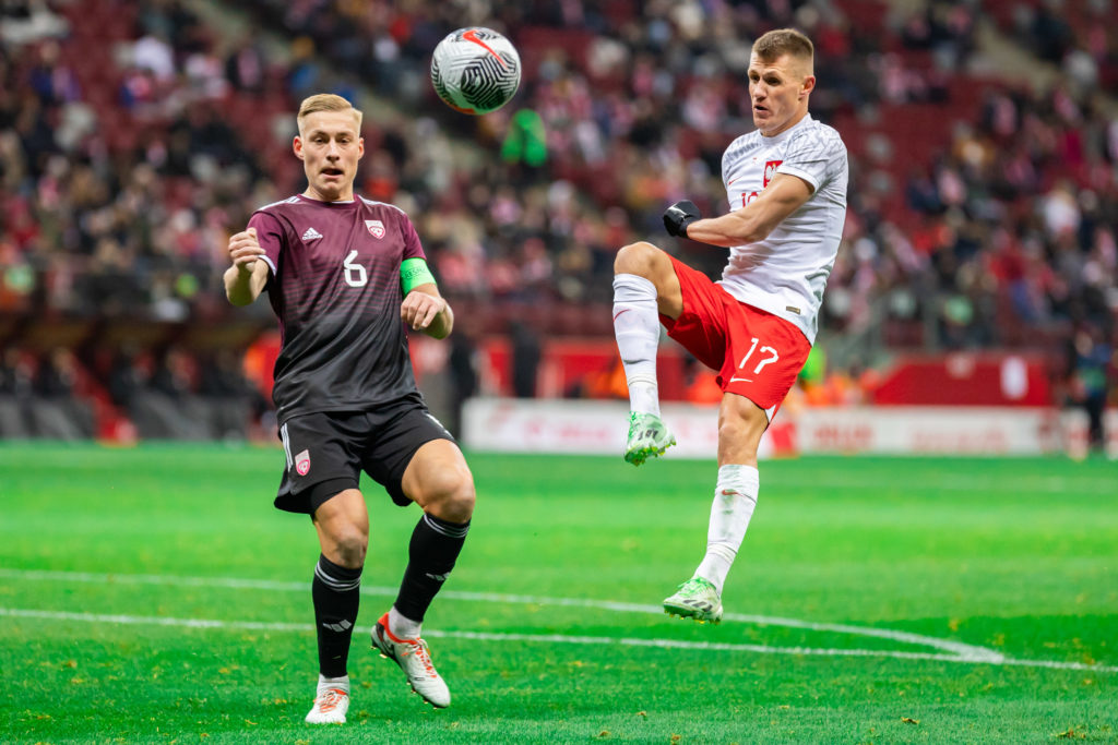 Kristers Tobers (L) of Latvia and Damian Szymanski (R) of